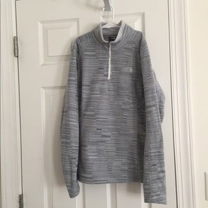 grey north face pull over
